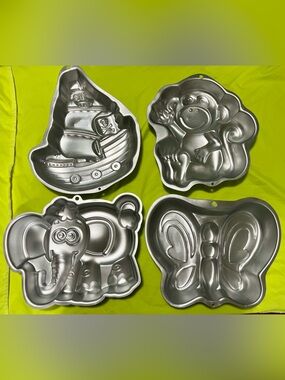 Four Wilton Aluminum Cake Pans. Monkey, Butterfly, Elephant, Pirate ship Set. 4